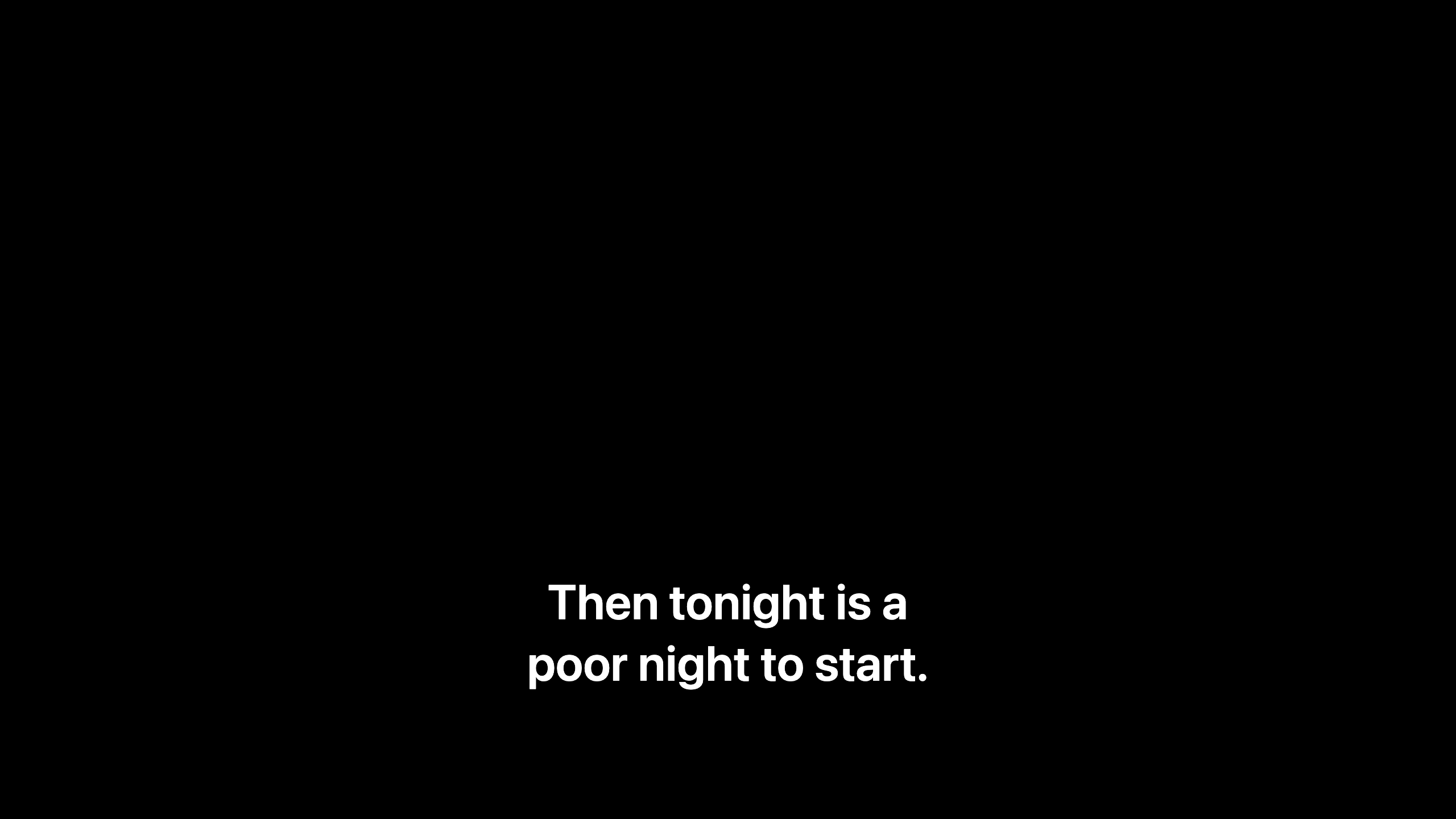 The projector output: white subtitle text on a black screen
